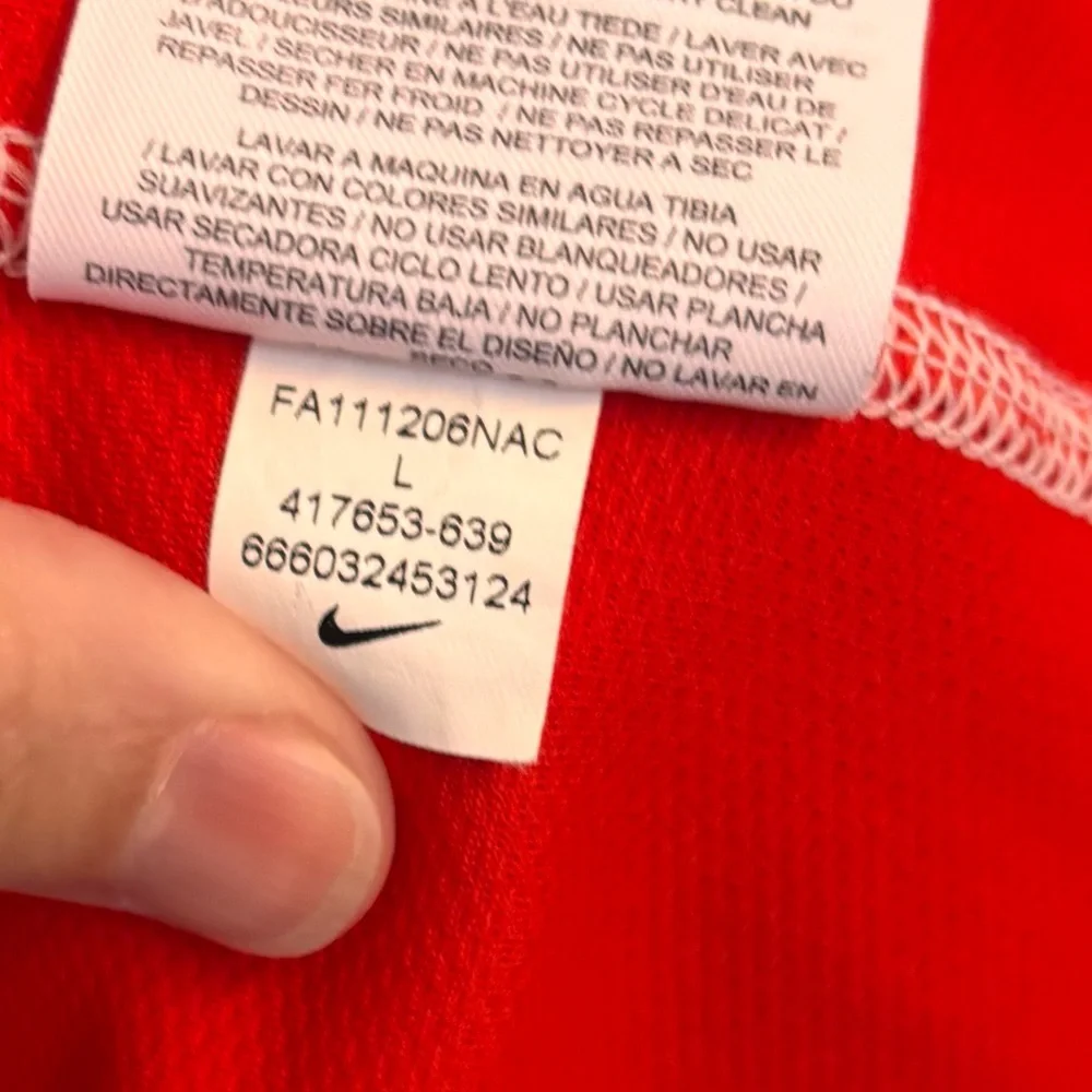 Nike women’s golf polo red with black sleeves slim fit
